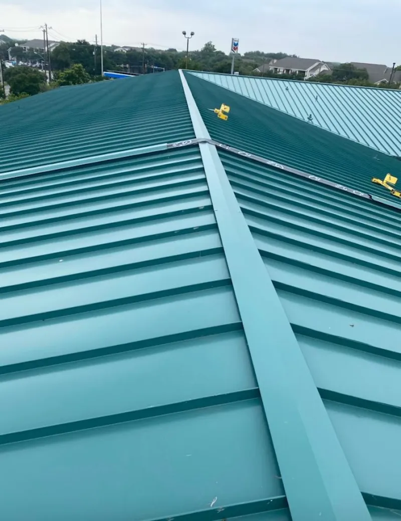 Green commercial metal roof ridge and valley for Metal Roof Repair in Jeffersontown