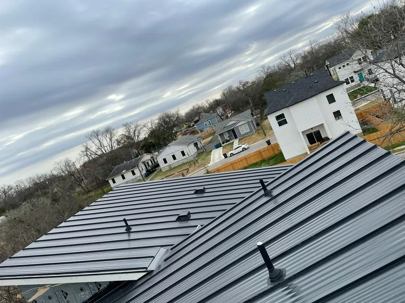 Standing seam metal roof panels with vents for Skylight Repair in Jeffersontown